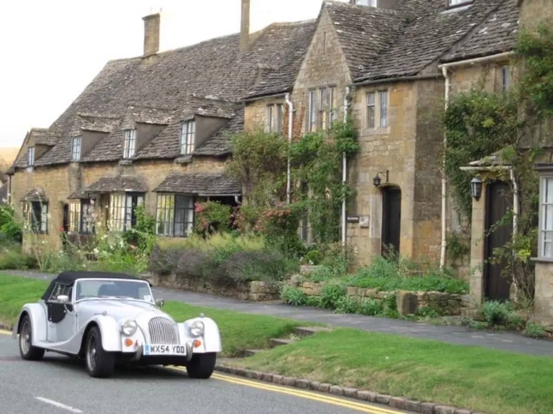 Broadway High Street lined with Cotswold-stone buildings
