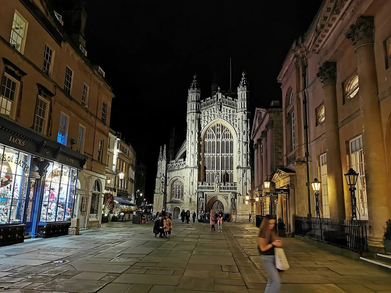 Bath Abbey illuminated at night in the Abbey Churchyard