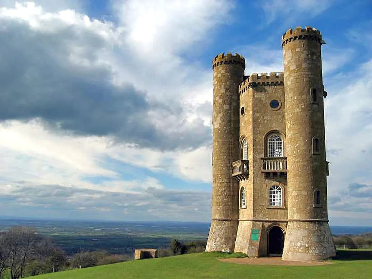 Broadway Tower on a green hill above the Vale of Evesham