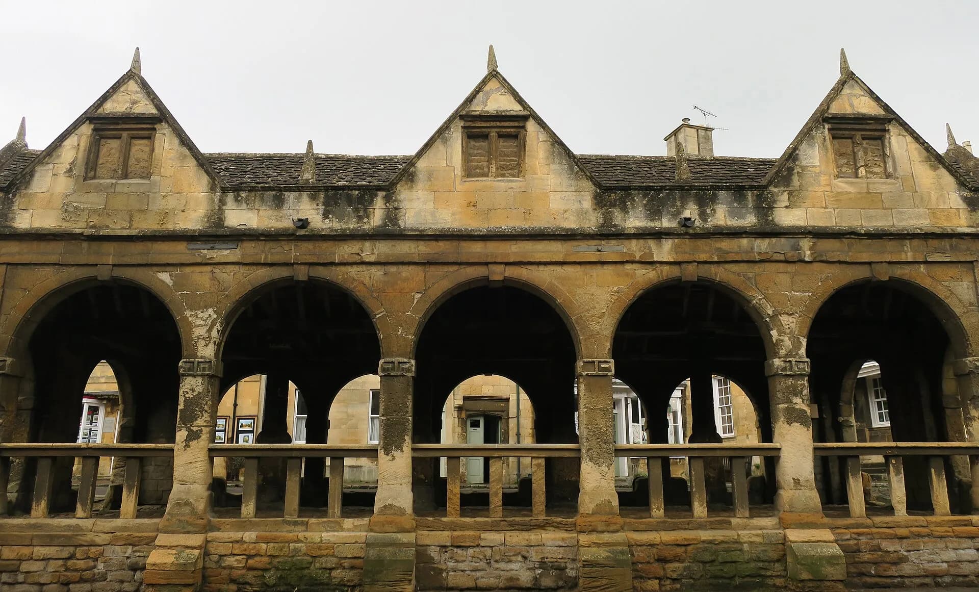 Chipping Campden Market Hall, honey stone arches at the northern start of the Cotswold Way