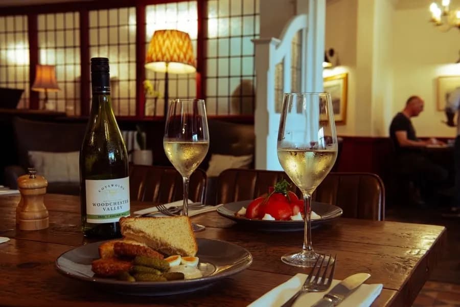 Light lunch plates and Woodchester Valley wine at The Falcon Inn