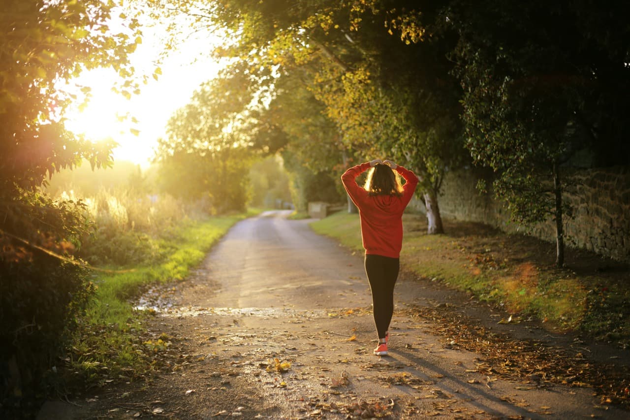 People running along countryside trails
