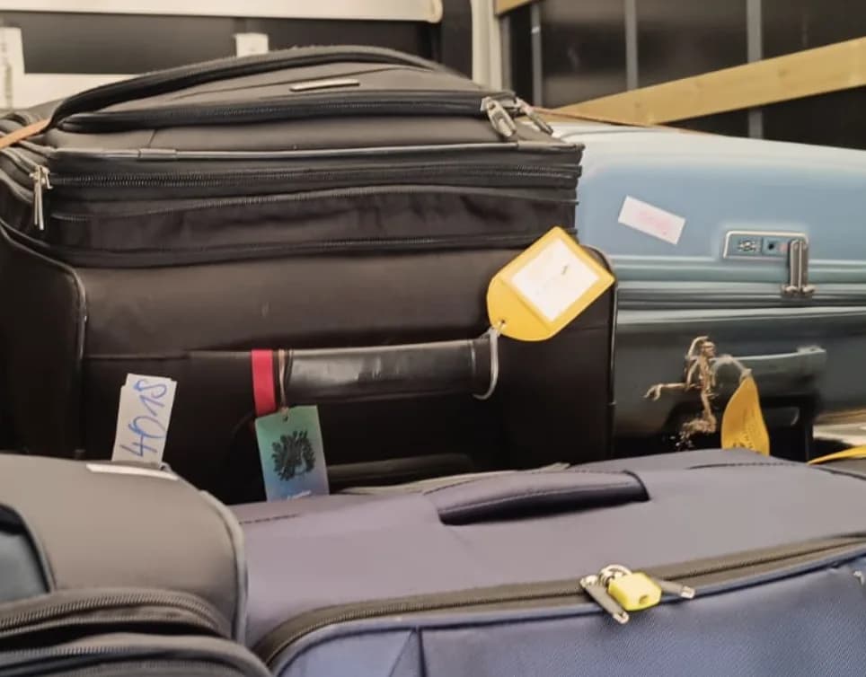 Stacked suitcases ready for luggage transfer between trail stops