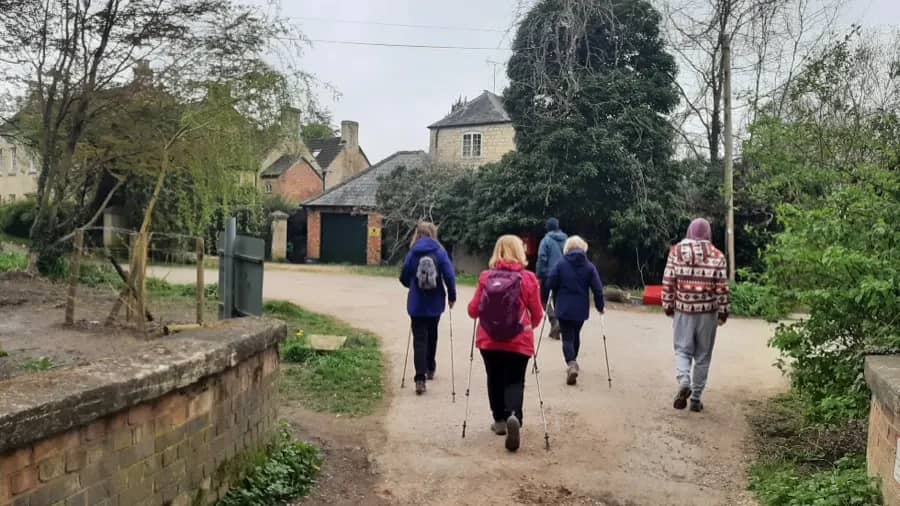 Walkers on a village path during Stonehouse Walking Festival