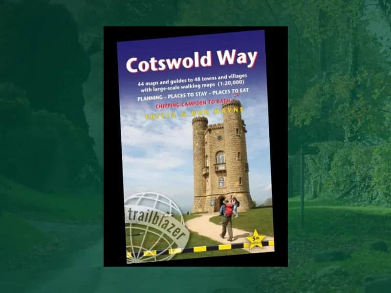 Trailblazer Cotswold Way guidebook on a green woodland background