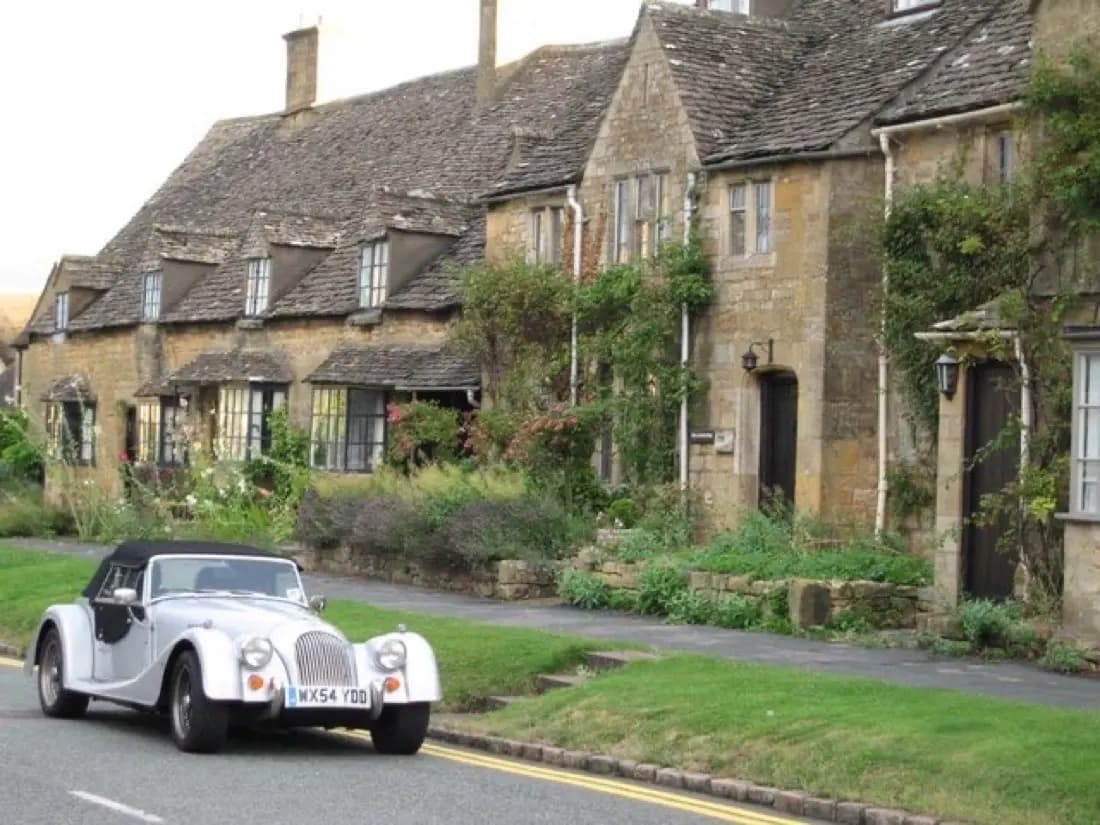 Broadway High Street lined with Cotswold-stone buildings