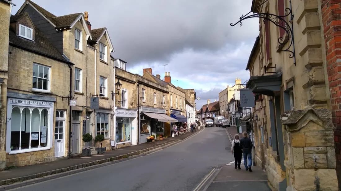 Winchcombe High Street with stone buildings and shops